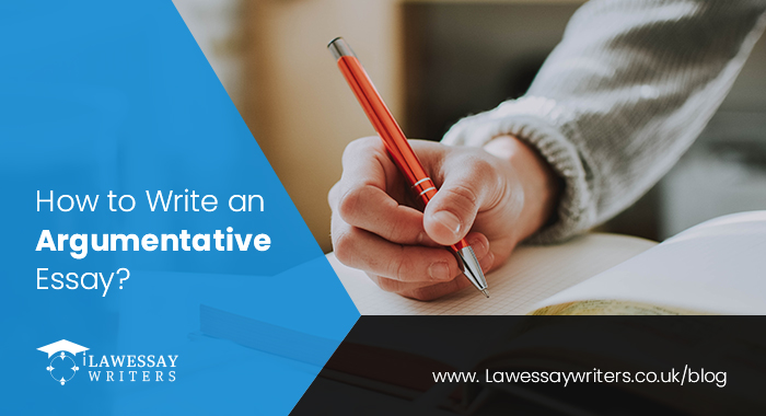 student holding pen to write an argumentative essay
